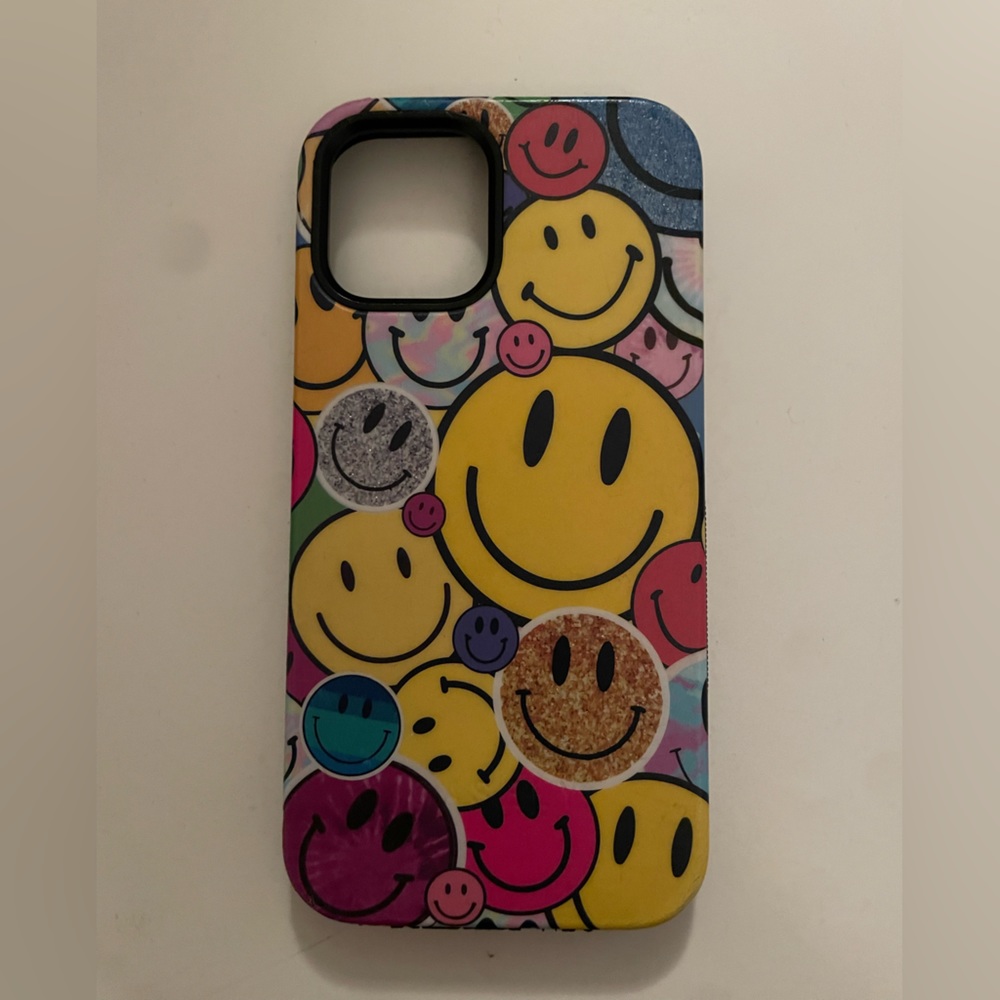 CASELY iphone 12 case- smiley stickers. lightly used, good condition.